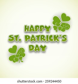 Happy St. Patrick's Day celebration greeting card design with shamrock leaves.