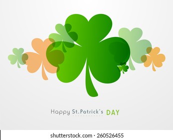 Happy St. Patrick's Day celebration background with shamrock leaves.