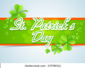 Happy St. Patricks Day celebrations concept with stylish text decorated by Irish lucky four leaf clover on blue and green background.