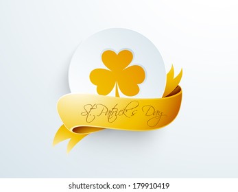 Happy St. Patrick's Day celebrations sticker, tag or label decorated by orange clover leaf with orange ribbon on grey background.
