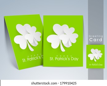 Happy St. Patrick's Day celebrations concept with beautiful flyer design decorated by white clover leaves on grey background.
