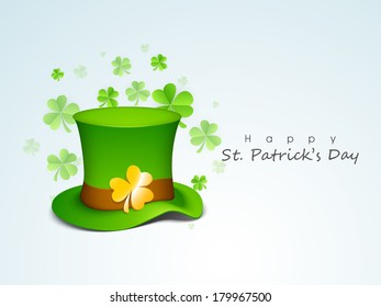 Happy St. Patrick's Day celebrations concept with leprechauns hat and gold coins on blue background. 