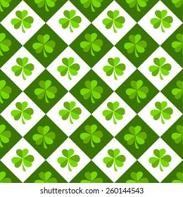 Happy St. Patrick's Day celebrations background made by shiny shamrock leaves.