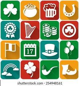Happy St. Patrick's Day! Collection of holiday icons in flat style with long shadows. Set of 16 white silhouette symbols on a colorful plates. Vector illustration. 