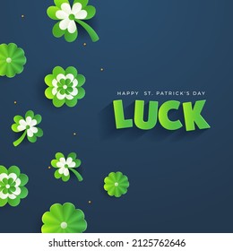 Happy St. Patrick's Day Concept With Green Paper Cut Luck Text, Shamrock Leaves And Flowers Decorated On Blue Background.