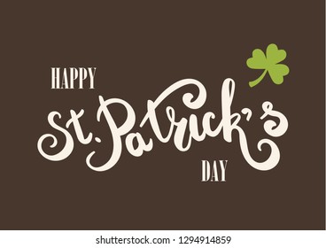 Happy St. Patricks Day greeting card.  Hand drawing lettering. Clover leaf symbol. Green leaf. Symbol of St. Patricks Day.