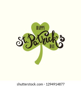 Happy St. Patricks Day greeting card.  Hand drawing lettering. Clover leaf symbol. Green leaf. Symbol of St. Patricks Day.