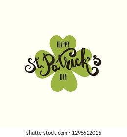 Happy St. Patricks Day greeting card.  Hand drawing lettering. Clover leaf symbol. Green leaf. Symbol of St. Patricks Day.