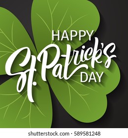 Happy St. Patrick's Day greeting. Lettering St. Patrick's Day on a dark background with shamrock. Vector illustration.