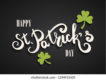 Happy St. Patrick's Day hand lettering. Clover leaf symbol. Symbol of St. Patrick's Day. Green letters on black background.2