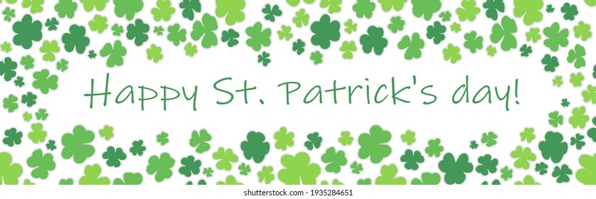 Happy St Patrick's Day handwritten typography lettering design with green clovers. Saint Patrick holiday isolated on white background banner.