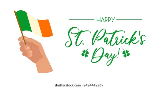 Happy St. Patricks Day horizontal banner. Hand with the flag of Ireland. Four leaf clover, symbol of good luck. Religious traditions. For banner, website, poster, flyer