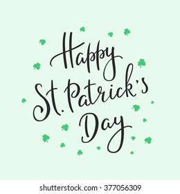 Happy St Patricks day simple lettering. Calligraphy postcard or poster graphic design lettering element. Hand written calligraphy style Saint Patrick postcard design. Photography overlay sign detail.