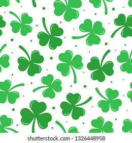 Happy St. Patrick's day vector seamless pattern. Green clover with dots on white background. Perfect for wrapping paper or textile.