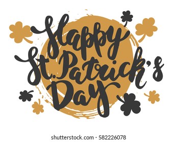 Happy St Patrick;s Day vector black hand lettering. Calligraphy with gold clover