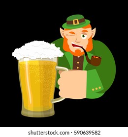 Happy St.Patrick 's Day. Leprechaun and mug beer. Dwarf with red beard mug ale. Holiday in Ireland