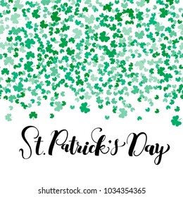 Happy St.Patrick's Day hand drawn lettering for designing of invitation, greeting card, poster, banner, holiday sales/ promo materials. Vector elegant calligraphy on shamrock pattern as background
