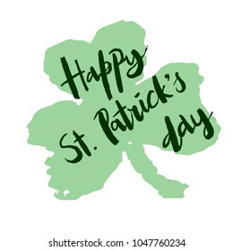 Happy St.Patrick's Day hand drawn lettering and shamrock as a background for Irish holiday greeting card, poster, banner, logo, icon. Modern grunge ink style calligraphy