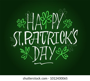 Happy St.Patrick's day lettering. Creative brush pen calligraphy with clovers illustration. Hand drawn postcard. Inscription on white background.