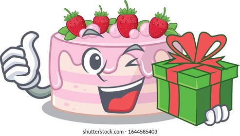 Happy strawberry cake character having a gift box