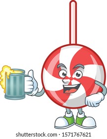 Happy striped peppermint candy holding a glass of beer