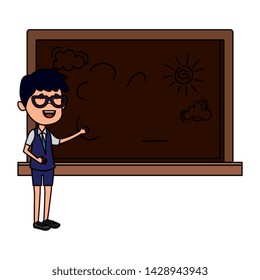 happy student boy drawing in chalkboard