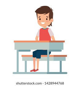 happy student boy seated in school desk