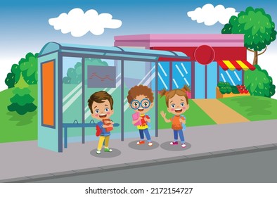 Happy Students Waiting For The Bus At The Bus Stop To Go To School