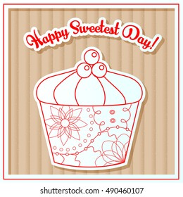 Happy sweetest day card with cupcake on cardboard