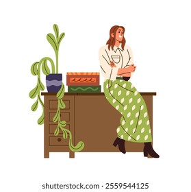 Happy teacher leans on wooden desk with houseplants, books. Young woman in green skirt crosses hands, sits on table and explains class at lesson. Flat isolated vector illustration on white background