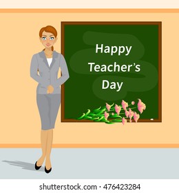 Happy Teacher's Day. A kind teacher stands at the blackboard. Vector illustration