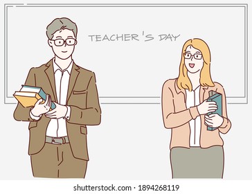 Happy Teacher's day. Male and female teacher holding books in front of a school blackboard. Hand drawn in thin line style, vector illustrations.