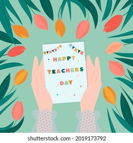 Happy teachers day vector illustration. Female hands hold a card with the inscription Happy Teacher's Day and a frame of tulip flowers.