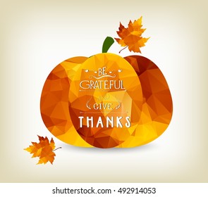Happy Thanksgiving background with autumn polygonal leaves and a pumpkin