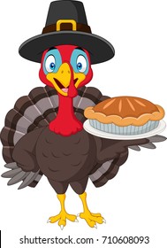 Happy thanksgiving card with turkey holding pie