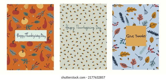 Happy Thanksgiving cards set design. Hand-lettered greeting phrase, decoration with pumpkins, leaves, berries, oak acorns on light-blue background