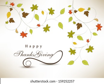 Happy Thanksgiving Day background with colorful maple leaves on grey background. 