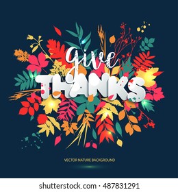 Happy Thanksgiving day in calligraphic hand drawn style and paper style. Fall style for autumn.Happy Thanksgiving Day greeting card design with colors leaves on blue background with grunge blots. 