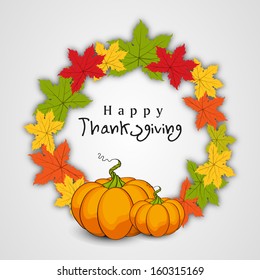 Happy Thanksgiving Day concept with beautiful autumn leaves and pumpkins, can be use as flyer, banner or poster. 