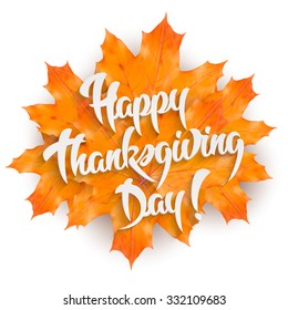 Happy Thanksgiving Day - hand lettering greeting card design element with maple leaves, isolated on white background