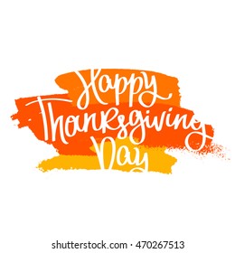 Happy Thanksgiving Day. The trend calligraphy. Vector illustration on white background with ink smear of red, orange and yellow. Great holiday gift card. Handwritten design.