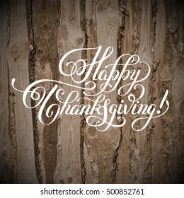 Happy Thanksgiving handwritten lettering inscription on wood background for greeting card, poster, print and holidays design, calligraphy vector illustration