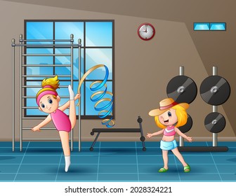 Happy two girls exercising in the gym