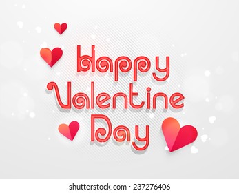Happy Valentine Day celebration poster, banner or flyer with paper heart and stylish text on shiny background.