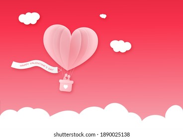 Happy valentine day. Heart air balloon with couple lover silhouette floating over the sky. Paper cut style. Vector illustration.