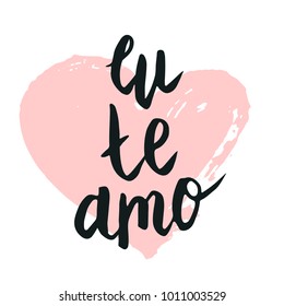 Happy valentine lettering Eu te amo (I love you in Spanish) hand written and isolated on white with heart background.