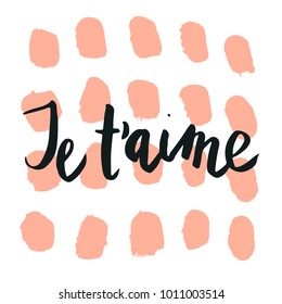 Happy valentine lettering Je t'aime (I love you in French) hand written and isolated on white with circle shape background.