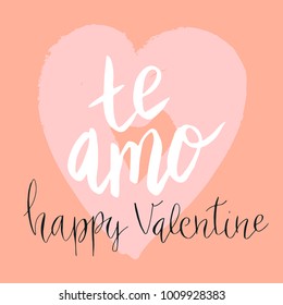 Happy valentine lettering te amo (I love you in Spanish) hand written with dry brush heart background.