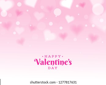 Happy Valentine's Day background decorated with Blur heart shapes. Can be used as greeting card design.