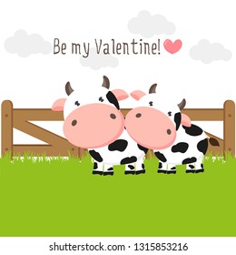 Happy Valentines Day background for greeting card. Couple of cute cows in love on green grass field.